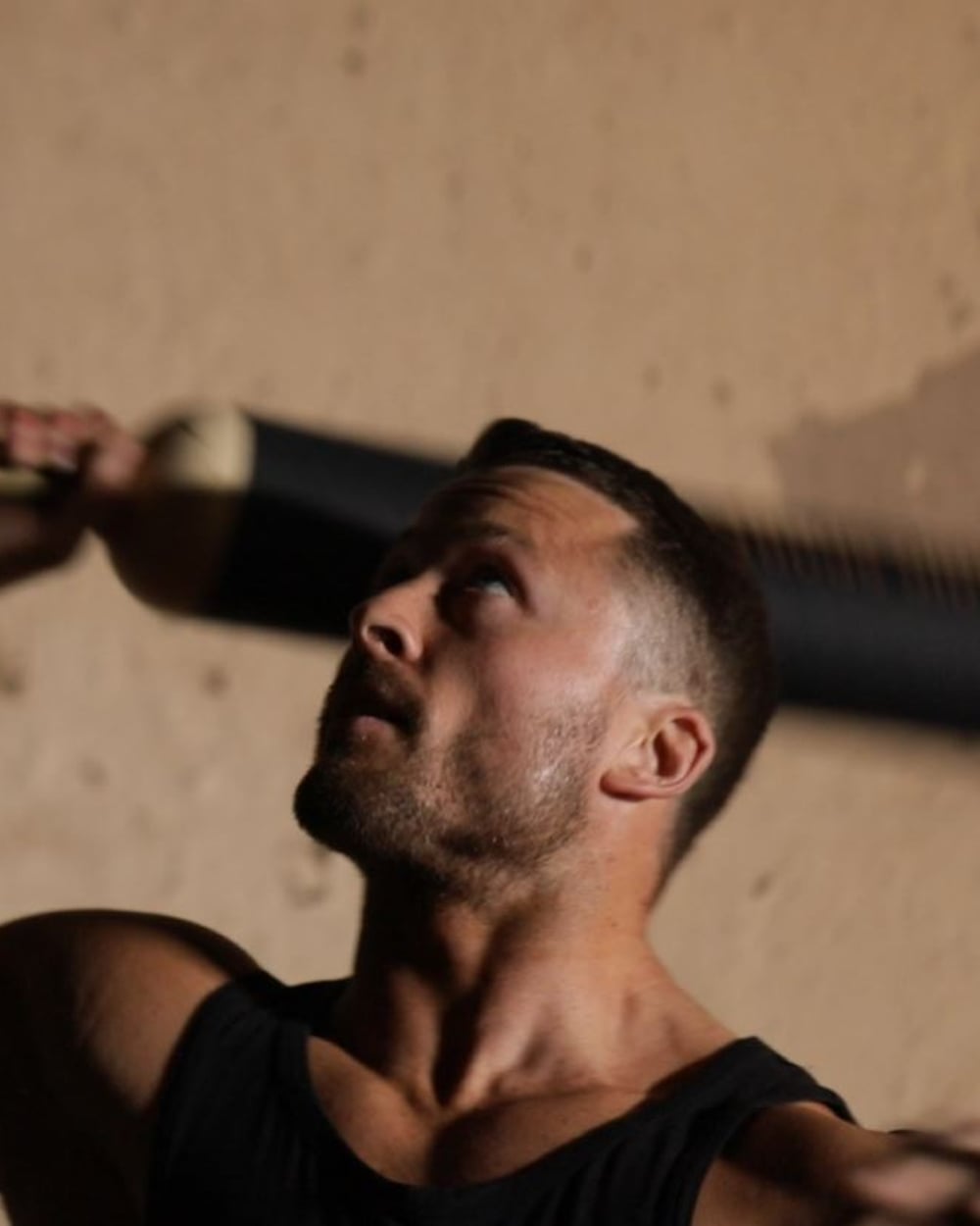 James Griffiths training with a steel mace