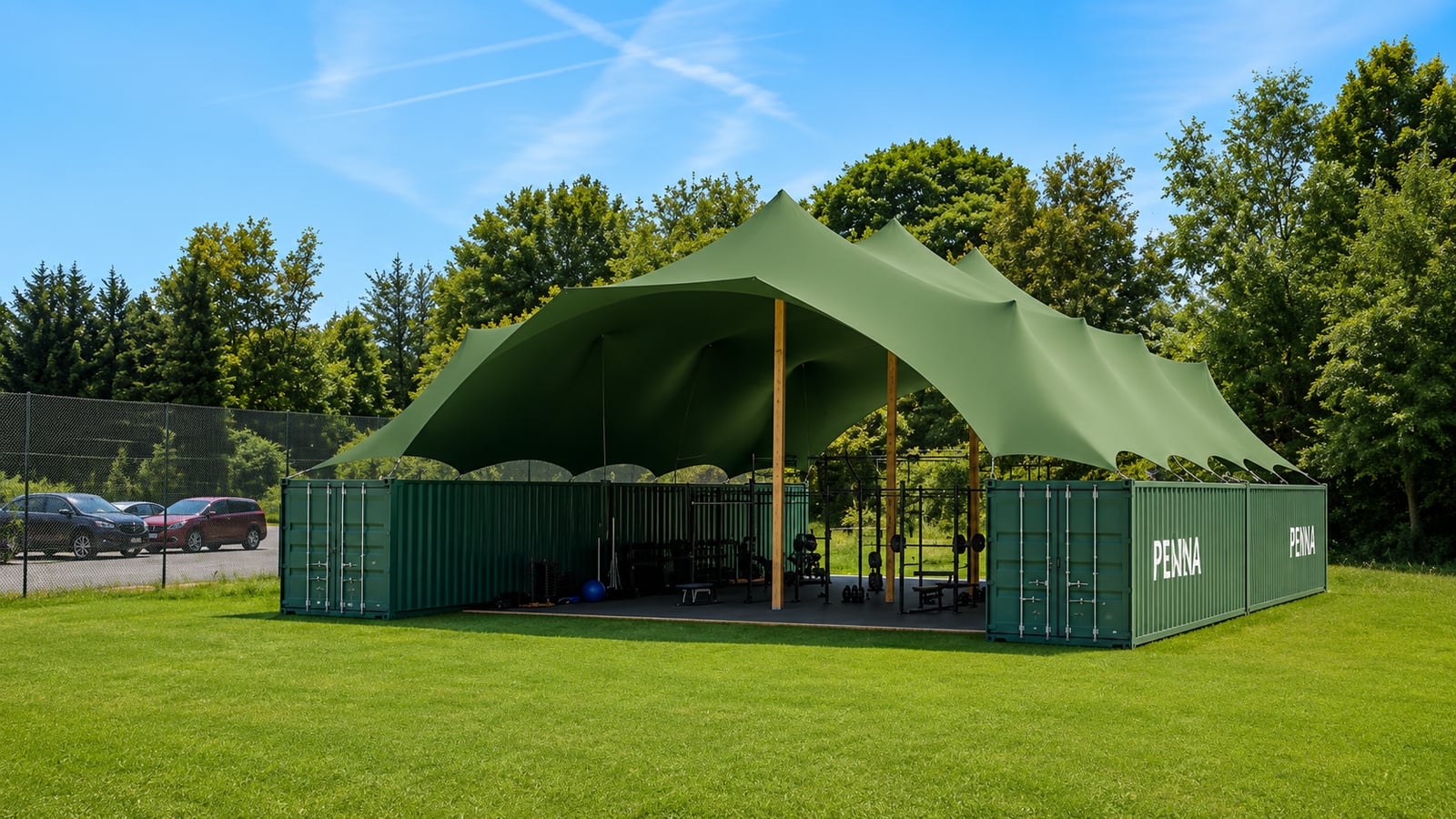 The covered outdoor gym under its green canopy on the grounds